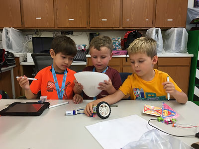 Students working on hands-on STEM projects